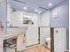 Modern bathroom featuring a glass enclosed shower, white subway tile, and wood accents at 323 Paradise Rd, Golden, CO 80401