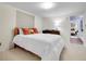 Comfortable bedroom with plush carpeting, natural light, and closet at 323 Paradise Rd, Golden, CO 80401