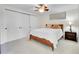 Cozy bedroom with a ceiling fan, closet, and warm natural light at 323 Paradise Rd, Golden, CO 80401