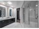 Modern bathroom with double vanity and large shower at 975 N Lincoln St # 15A, Denver, CO 80203