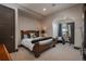 Spacious bedroom with a large bed, city views, and comfortable seating at 975 N Lincoln St # 15A, Denver, CO 80203