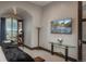 Bright bedroom with city views and a stylish media console at 975 N Lincoln St # 15A, Denver, CO 80203