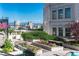 Landscaped courtyard with flowers and seating at 975 N Lincoln St # 15A, Denver, CO 80203