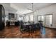 Elegant dining area with dark wood table and chairs, and modern chandelier at 975 N Lincoln St # 15A, Denver, CO 80203