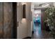 Building entry with elevator and view into a spacious dining area at 975 N Lincoln St # 15A, Denver, CO 80203
