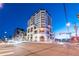 Elegant high-rise building at night, showcasing architectural details and city views at 975 N Lincoln St # 15A, Denver, CO 80203