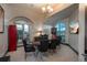 Game room with a poker table, city views, and large screen TV at 975 N Lincoln St # 15A, Denver, CO 80203