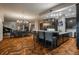 Modern kitchen with dark cabinetry, marble countertops, and stainless steel appliances at 975 N Lincoln St # 15A, Denver, CO 80203
