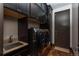 Laundry room with modern appliances and ample storage at 975 N Lincoln St # 15A, Denver, CO 80203