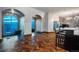 Open concept living space with city views and spiral staircase at 975 N Lincoln St # 15A, Denver, CO 80203