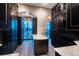 Large walk-in Primary closet with custom built-ins and city views at 975 N Lincoln St # 15A, Denver, CO 80203