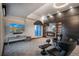 Home theater with electric fireplace and city views at 975 N Lincoln St # 15A, Denver, CO 80203