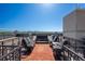 Relaxing rooftop deck with seating area and city views at 975 N Lincoln St # 15A, Denver, CO 80203