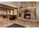 Cozy lobby area with stone fireplace and comfortable seating at 34 Highfield Trl # 311, Breckenridge, CO 80424