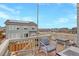 Deck with outdoor seating with mountain views in the distance at 12917 Fox St, Westminster, CO 80234