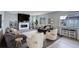 Inviting living area features a modern fireplace, comfortable sofas, and stylish decor for a cozy atmosphere at 12917 Fox St, Westminster, CO 80234