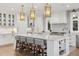Bright kitchen featuring a large island with seating and modern appliances, a chef's dream at 2130 S Milwaukee St, Denver, CO 80210