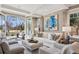Bright and airy living room with French doors to outdoor patio, offering seamless living at 2130 S Milwaukee St, Denver, CO 80210