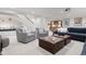 A spacious living room features recessed lighting, a wet bar, and comfortable seating at 2130 S Milwaukee St, Denver, CO 80210