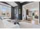Comfortable living room features vaulted ceilings, large windows, and a stylish decor at 2130 S Milwaukee St, Denver, CO 80210