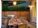 Outdoor dining area with grill and nicely set table at 2130 S Milwaukee St, Denver, CO 80210