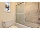 Well-maintained bathroom featuring a shower and bathtub combination with tiled walls at 955 Eudora St # 407E, Denver, CO 80220