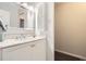 Bathroom with a large mirror, vanity, and storage cabinet at 955 Eudora St # 407E, Denver, CO 80220
