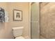 Bathroom with a shower and bath combination with tiled walls at 955 Eudora St # 407E, Denver, CO 80220