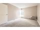 Neutral bedroom featuring neutral carpet and an air conditioning unit at 955 Eudora St # 407E, Denver, CO 80220