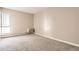 Neutral bedroom featuring neutral carpet and an air conditioning unit at 955 Eudora St # 407E, Denver, CO 80220