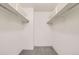 Spacious walk-in closet featuring rods for hanging clothes and storage shelves at 955 Eudora St # 407E, Denver, CO 80220
