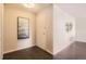 Welcoming entryway with dark wood floors and a stylish modern art piece at 955 Eudora St # 407E, Denver, CO 80220
