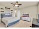 Bedroom with carpet, ceiling fan, and good natural light at 1033 Petras St, Erie, CO 80516