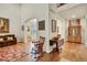 Elegant living room with hardwood floors, classic furniture, and ample natural light at 1033 Petras St, Erie, CO 80516