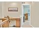 Upstairs hallway office space with desk and lots of natural light at 1033 Petras St, Erie, CO 80516