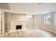 Finished basement offers a cozy fireplace, plank flooring, and neutral paint, creating a versatile living space at 1533 S Columbine St, Denver, CO 80210