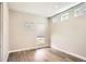 Minimalist bedroom design with sleek hardwood floors and natural light streaming through modern windows at 1533 S Columbine St, Denver, CO 80210