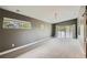 Spacious bedroom with sliding glass doors and modern light fixture at 1533 S Columbine St, Denver, CO 80210
