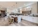 Spacious kitchen with a marble island, stainless steel appliances, and an open layout at 1533 S Columbine St, Denver, CO 80210