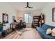 Office space with sleek desk, ample lighting and hardwood floors at 11253 Moondance Trl, Littleton, CO 80125