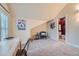 Bright bedroom offers a dedicated workspace, chair, and ensuite bathroom for ultimate convenience at 753 Pearl St, Boulder, CO 80302