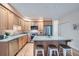 Bright kitchen features stainless steel appliances, granite countertops, and island with breakfast bar at 753 Pearl St, Boulder, CO 80302
