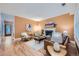 Open-concept living room with hardwood floors, fireplace, and stylish furnishings at 753 Pearl St, Boulder, CO 80302