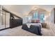 Bedroom features a plush bed, ample natural light, and a spacious dresser at 753 Pearl St, Boulder, CO 80302