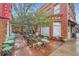 Charming bakery rear entrance with outdoor seating and lush greenery at 753 Pearl St, Boulder, CO 80302