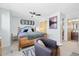 Serene main bedroom with ceiling fan, neutral tones, and ample natural light at 9494 Devonshire Pl, Highlands Ranch, CO 80126