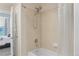 Fresh bathroom with a shower-tub combination and a showerhead, along with tile walls at 640 11Th St # 302, Golden, CO 80401