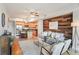 Inviting living room features wood floors, a decorative wood accent wall and a cozy sofa at 640 11Th St # 302, Golden, CO 80401