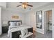 Cozy bedroom offering great natural light, a ceiling fan, and an attached closet at 640 11Th St # 302, Golden, CO 80401