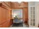 Comfortable office with custom cabinets, built-in desk, and natural light from the glass paneled doors at 640 11Th St # 302, Golden, CO 80401